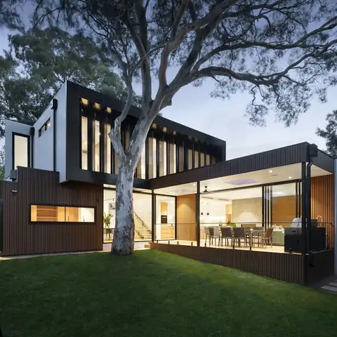 A modern house and lawn at dusk